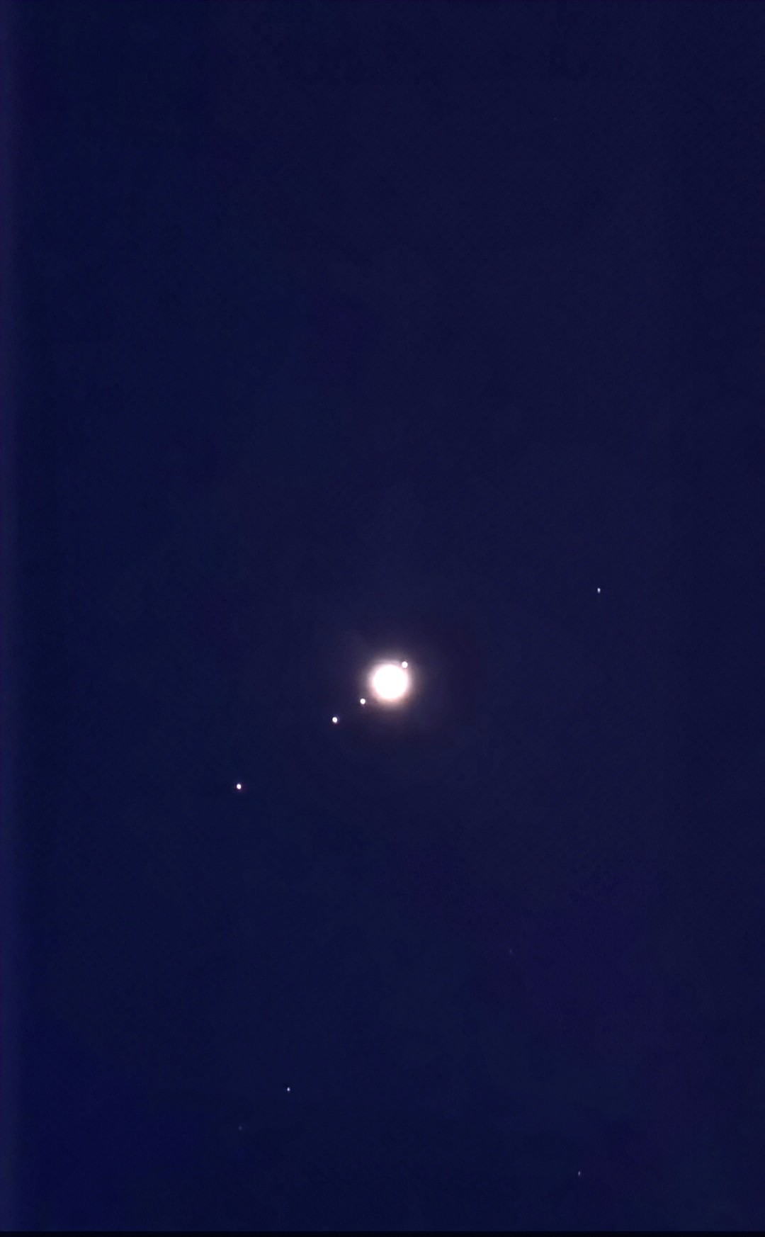An image of Jupiter and its moons